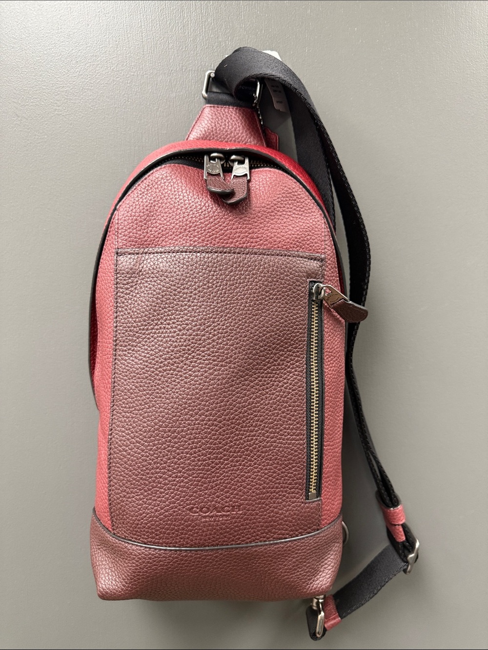 Coach Men's Pebbled Leather Sling Bag in Wine and Black